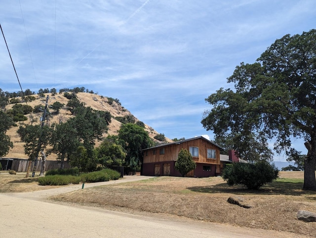 view of home's exterior with a mountain view