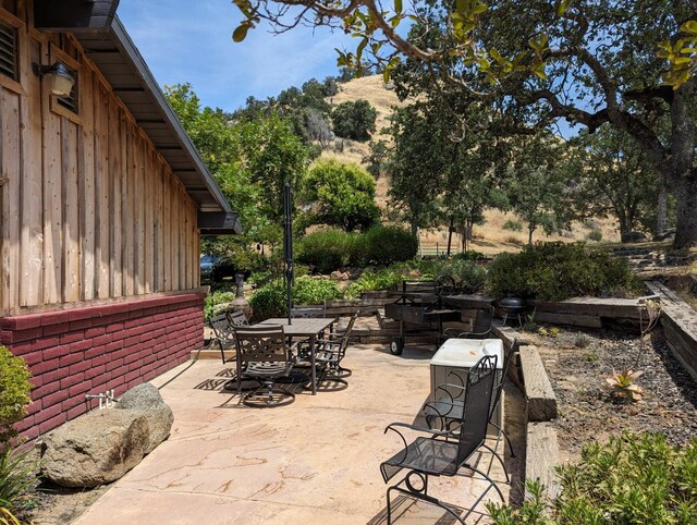 view of patio with outdoor dining area