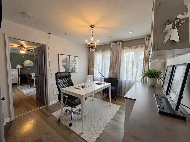 office with dark wood-style floors, baseboards, and a notable chandelier