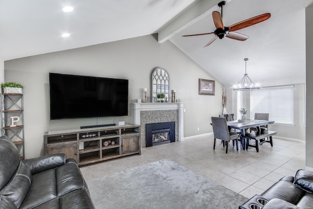 living area with baseboards, vaulted ceiling with beams, light tile patterned flooring, a fireplace, and ceiling fan with notable chandelier