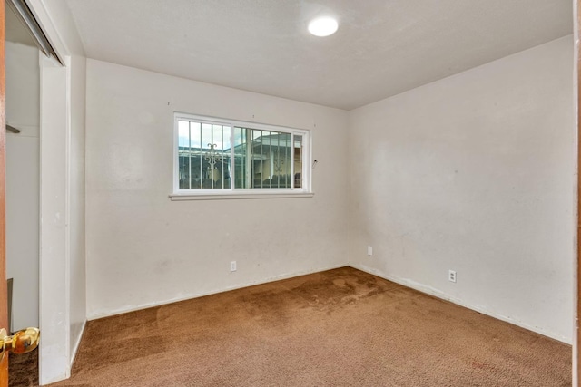 view of carpeted spare room