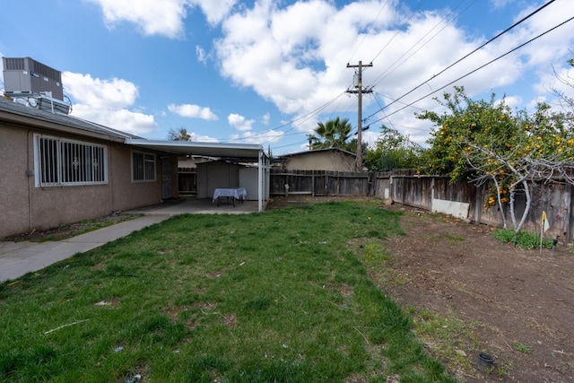 view of yard with a patio, cooling unit, and a fenced backyard