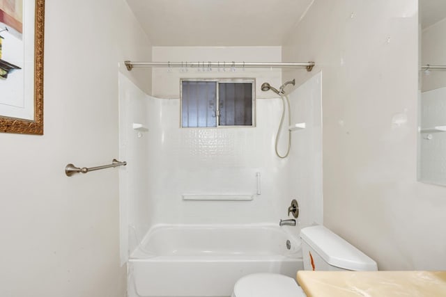 full bath featuring vanity, toilet, and shower / washtub combination