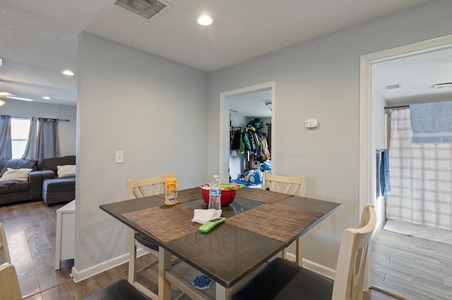 dining room with visible vents, wood finished floors, recessed lighting, baseboards, and ceiling fan