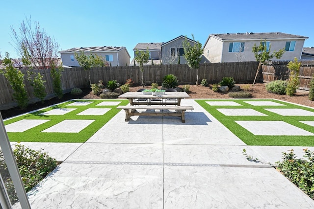 view of patio / terrace with outdoor dining area and a fenced backyard