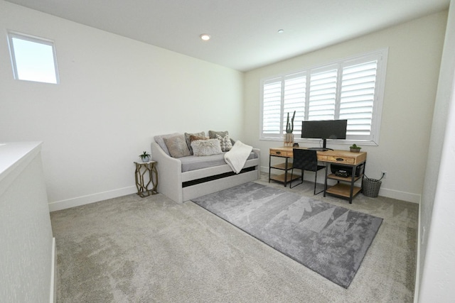 office space with carpet flooring and baseboards