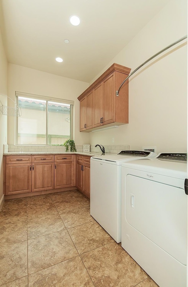 clothes washing area featuring recessed lighting, cabinet space, and independent washer and dryer