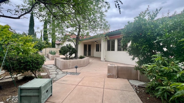 view of patio featuring a ceiling fan