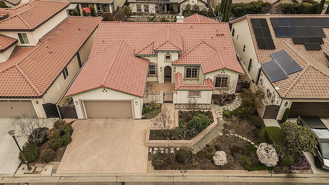 birds eye view of property with a residential view