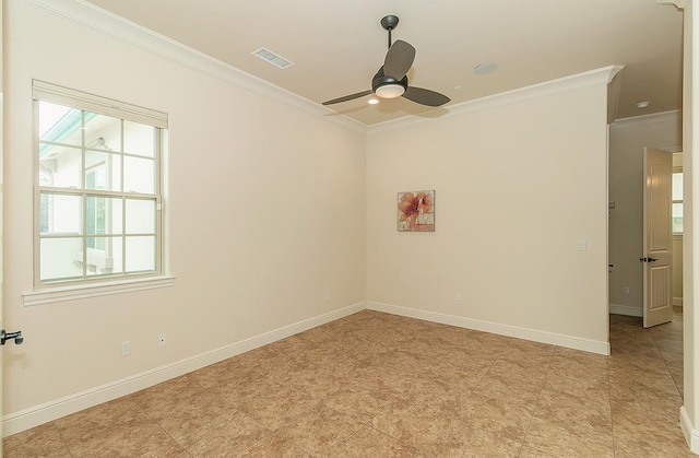 spare room featuring ceiling fan, baseboards, visible vents, and ornamental molding