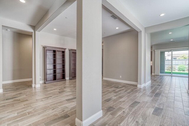 301 Pinnacle Dr W, Madera, CA 93636 - empty room featuring light wood-style flooring, baseboards, and recessed lighting