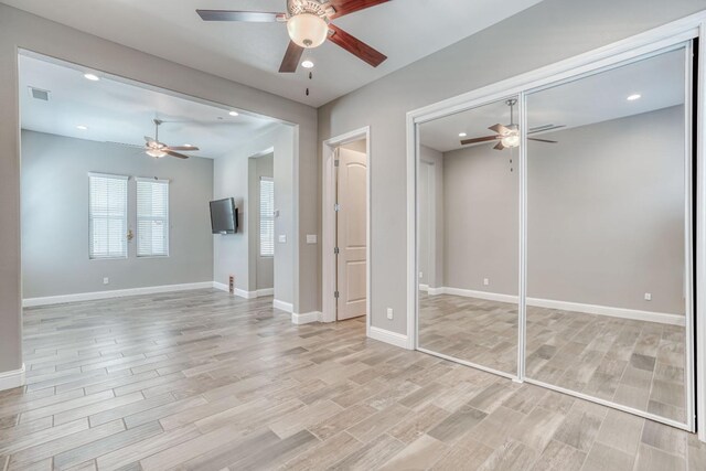 301 Pinnacle Dr W, Madera, CA 93636 - unfurnished bedroom with light wood-type flooring, baseboards, recessed lighting, and a ceiling fan