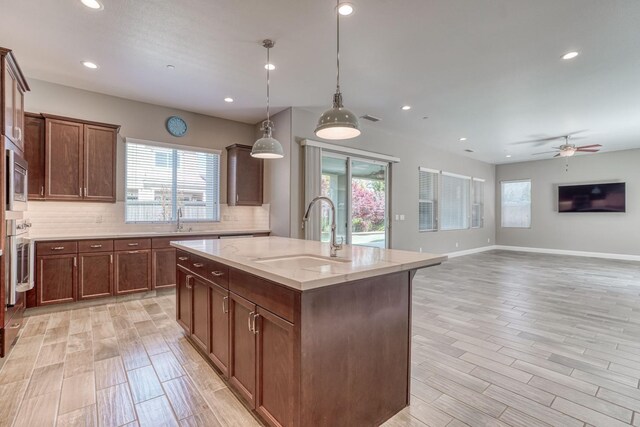 301 Pinnacle Dr W, Madera, CA 93636 - kitchen with a sink, healthy amount of natural light, and recessed lighting