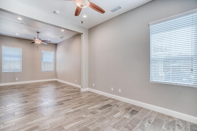 301 Pinnacle Dr W, Madera, CA 93636 - unfurnished room with a ceiling fan, baseboards, light wood-type flooring, and recessed lighting