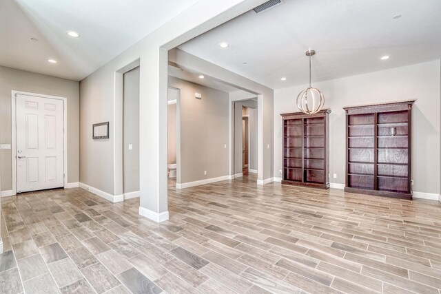 301 Pinnacle Dr W, Madera, CA 93636 - unfurnished room with recessed lighting, baseboards, and light wood-style flooring