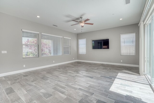 301 Pinnacle Dr W, Madera, CA 93636 - spare room featuring ceiling fan, light wood-type flooring, recessed lighting, and baseboards