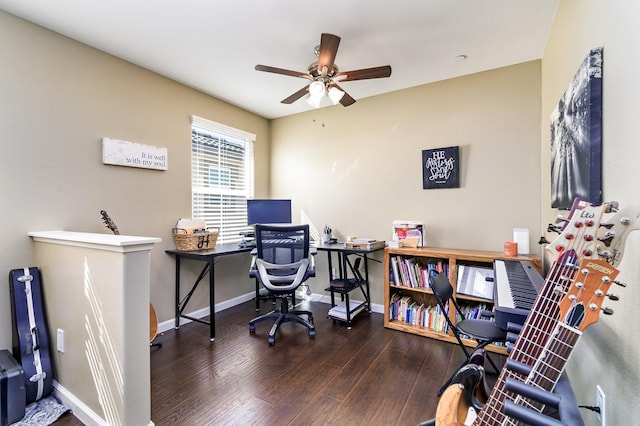 office featuring a ceiling fan, wood finished floors, and baseboards