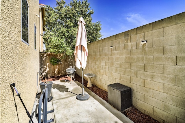 view of patio featuring a fenced backyard