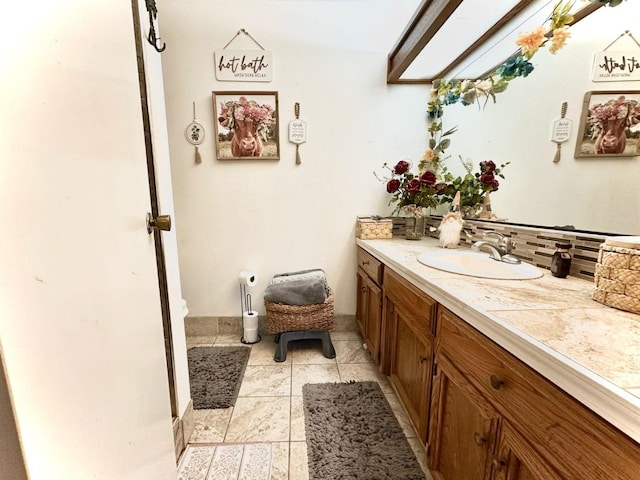 bathroom with vanity and tile patterned flooring