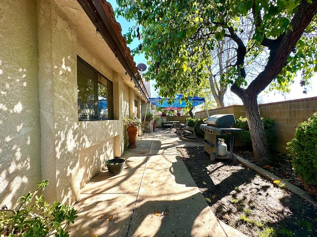 view of patio / terrace with a grill and a fenced backyard