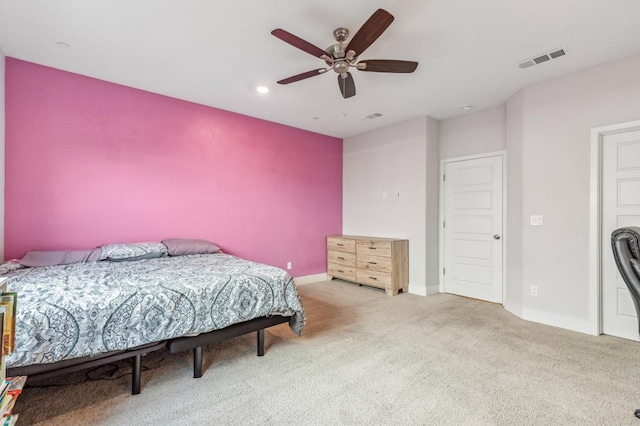 bedroom featuring visible vents, baseboards, carpet, recessed lighting, and a ceiling fan