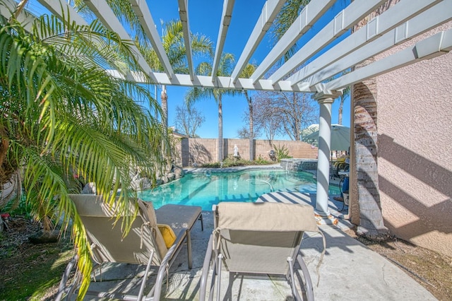 view of swimming pool featuring a fenced in pool, a patio, a pergola, and a fenced backyard