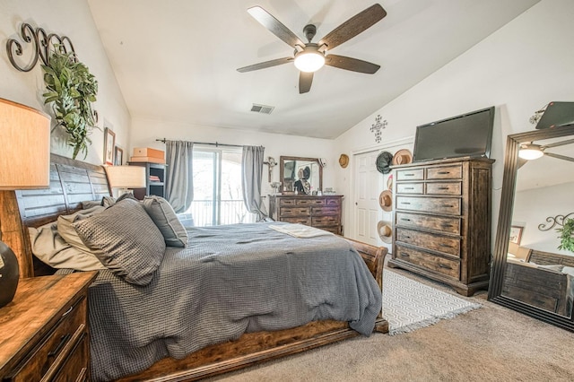 carpeted bedroom featuring visible vents, access to exterior, a ceiling fan, and vaulted ceiling