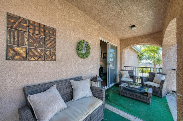 view of patio / terrace with a balcony