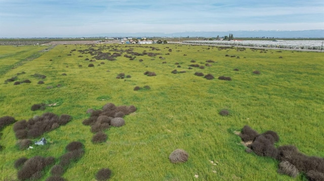 birds eye view of property featuring a rural view