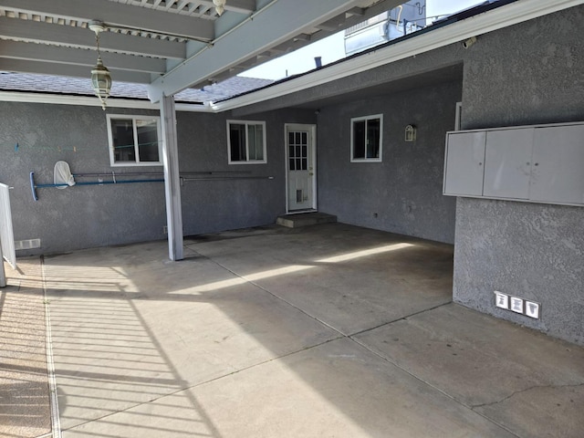 view of patio with an attached carport