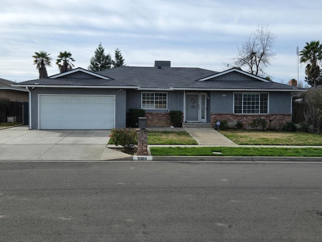 ranch-style home with driveway, fence, an attached garage, a front yard, and brick siding