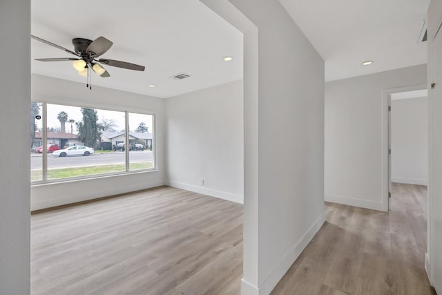 3823 E Clinton Ave, Fresno, CA 93703 - unfurnished room featuring wood finished floors, ceiling fan, and recessed lighting