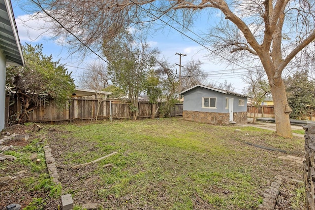 view of yard featuring a fenced backyard