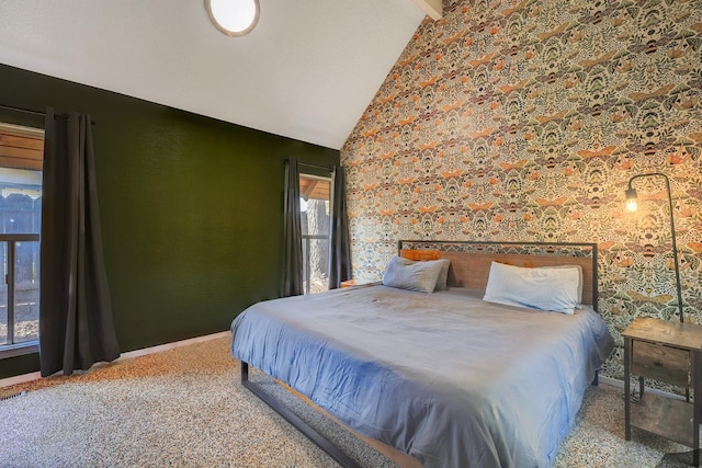 bedroom featuring vaulted ceiling and carpet flooring