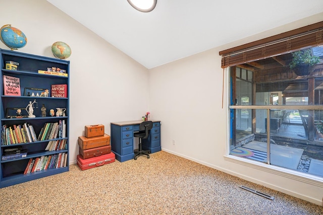 interior space with baseboards, visible vents, lofted ceiling, and carpet floors