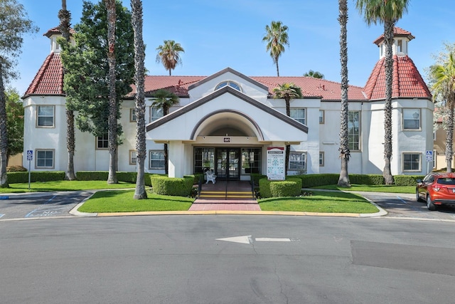 8153 N Cedar Ave Unit 106, Fresno, CA 93720 - view of building exterior featuring uncovered parking