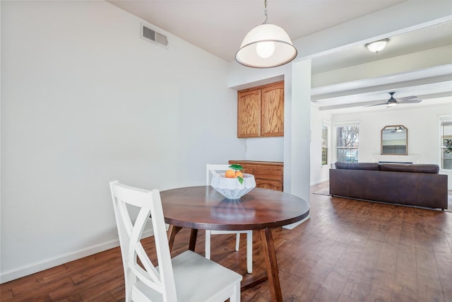 8153 N Cedar Ave Unit 106, Fresno, CA 93720 - dining room with a ceiling fan, hardwood / wood-style flooring, and baseboards