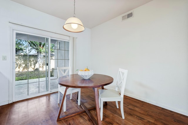 8153 N Cedar Ave Unit 106, Fresno, CA 93720 - dining area with wood finished floors, lofted ceiling, and baseboards