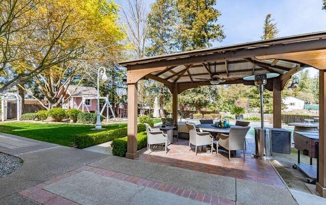 26189 Valerie Ave, Madera, CA 93638 - view of patio / terrace featuring a gazebo, outdoor dining space, and an outdoor living space