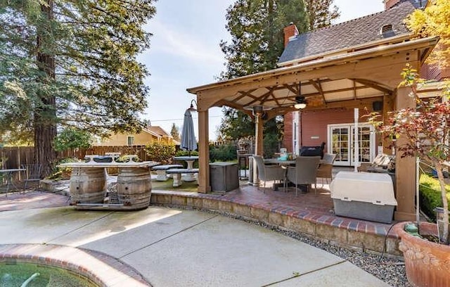 26189 Valerie Ave, Madera, CA 93638 - view of patio featuring outdoor dining area, a ceiling fan, and an outdoor kitchen