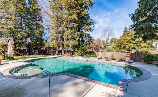 26189 Valerie Ave, Madera, CA 93638 - view of swimming pool with a patio