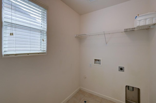 laundry area featuring laundry area, hookup for a washing machine, a healthy amount of sunlight, and hookup for an electric dryer