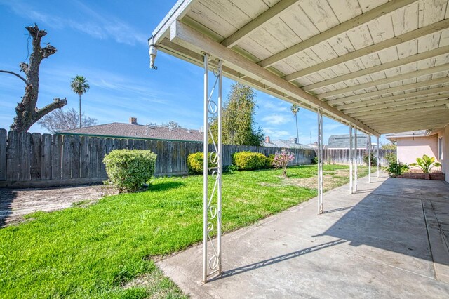 view of patio with a fenced backyard