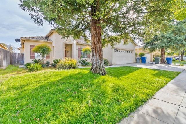 view of front of home featuring concrete driveway, fence, a front lawn, and stucco siding