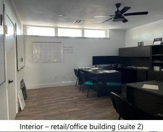 office featuring a ceiling fan and wood finished floors