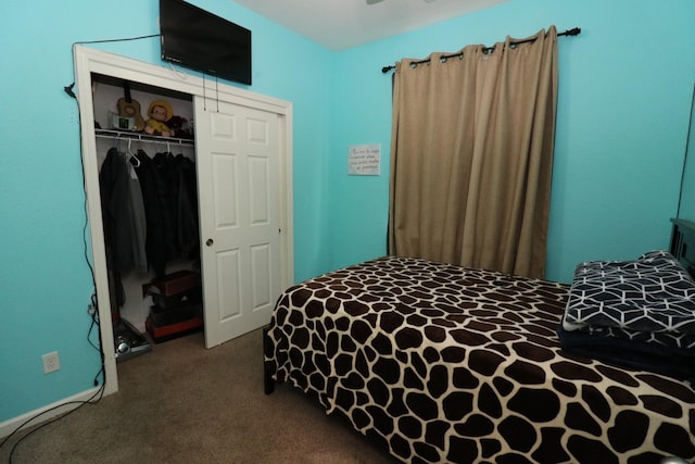 carpeted bedroom featuring a closet