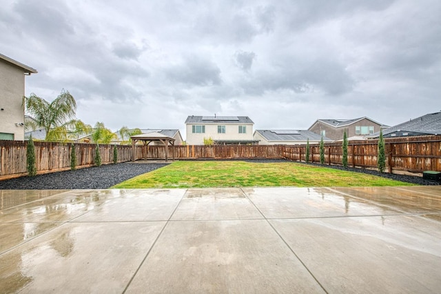 view of patio / terrace featuring a gazebo and a fenced backyard