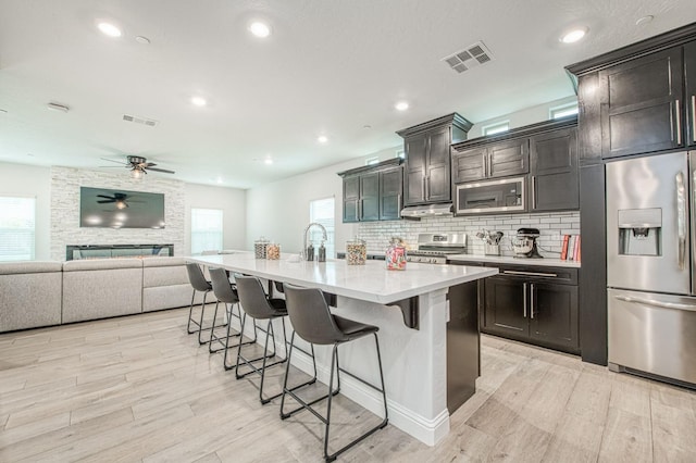 kitchen with plenty of natural light, visible vents, and stainless steel appliances