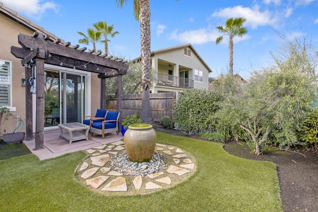 view of yard with a patio, fence, and a pergola