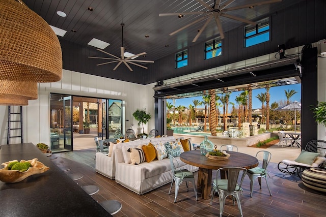 view of patio / terrace with an outdoor living space, outdoor dining space, and ceiling fan